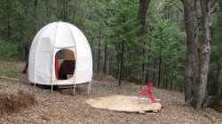 A PleniSphere® in the woods of Grass Valley, CA 2012. You can place a PleniSphere® on a deck, as shown here, or directly on the ground. 